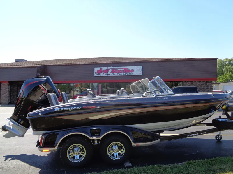 Slide: The Image of 2023 Ranger 1880 MS Angler boat on trailer outside dealership. - 8