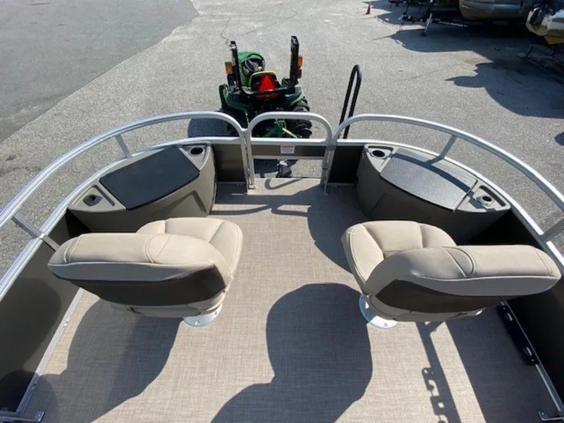 Slide: The Image of 2022 Sun Tracker FB 22 XP3 pontoon boat with beige seating and spacious deck. - 12