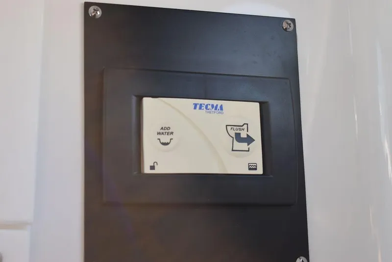 Slide: The Image of Control panel of Tecma toilet system in 2023 Blackfin 272CC boat. - 15