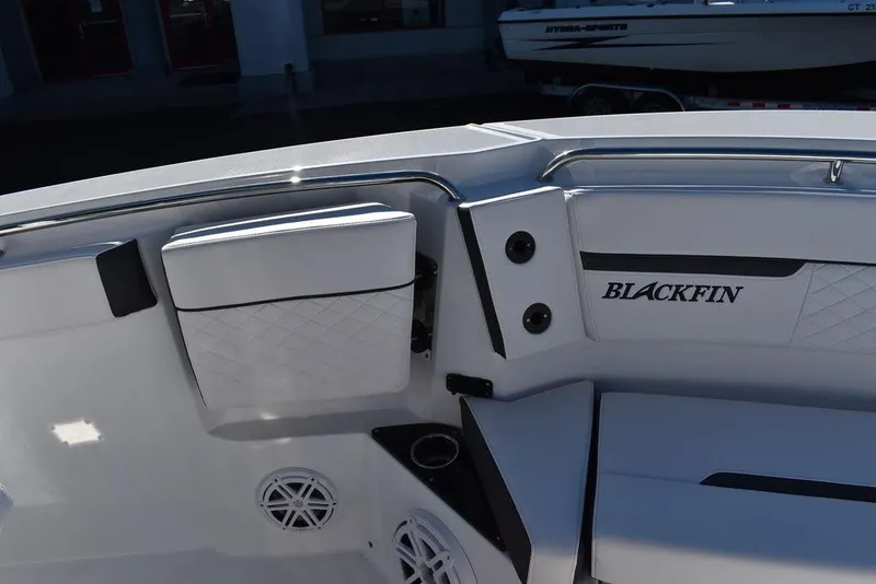 Slide: The Image of 2023 Blackfin 272CC boat interior with seating and speakers. - 20