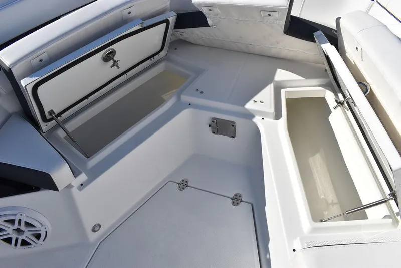 Slide: The Image of 2023 Blackfin 272CC boat interior storage compartments. - 22