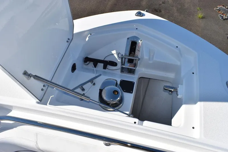 Slide: The Image of 2023 Blackfin 272CC anchor locker with windlass and storage compartments. - 25