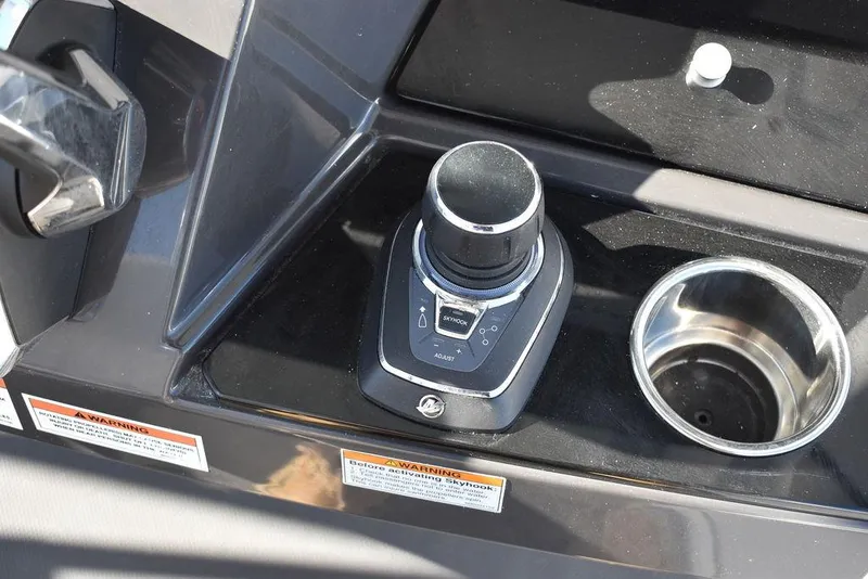 Slide: The Image of 2023 Blackfin 272CC boat control panel with joystick and cup holder. - 35