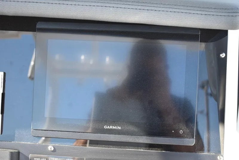 Slide: The Image of Garmin display on 2023 Blackfin 272CC boat dashboard. - 36