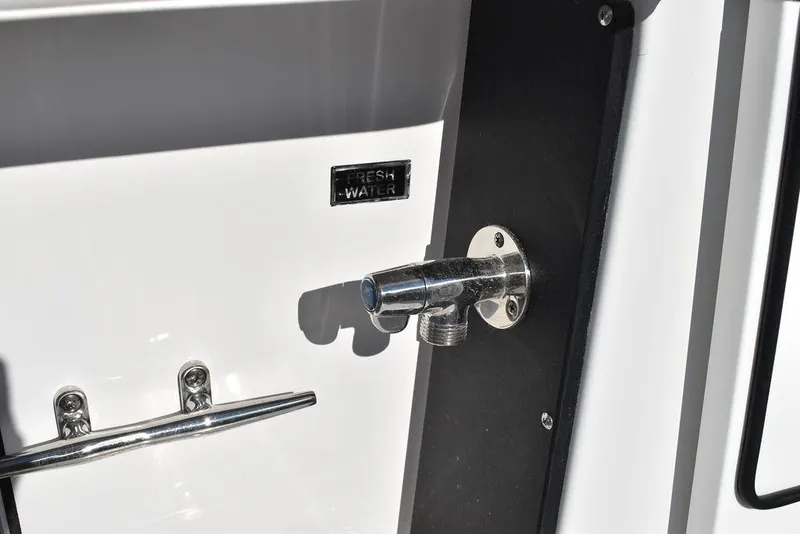 Slide: The Image of Freshwater outlet on 2023 Blackfin 272CC boat. - 47