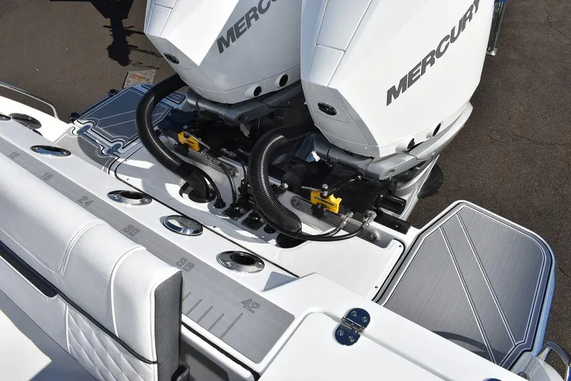 Slide: The Image of 2023 Blackfin 272CC boat with twin Mercury outboard engines. - 8