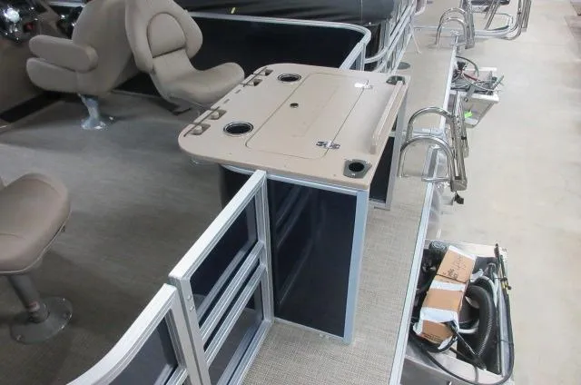 Slide: The Image of 2023 Sylvan MIRAGE 8522 Party Fish 4.0 interior with seating and fishing station. - 12