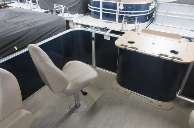 Slide: The Image of 2023 Sylvan MIRAGE 8522 Party Fish 4.0 interior with seating and table. - 8