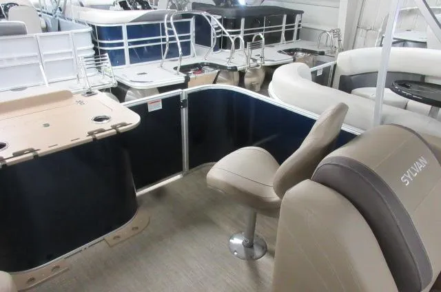 Slide: The Image of 2023 Sylvan MIRAGE 8522 Party Fish 4.0 interior with seating and table. - 9