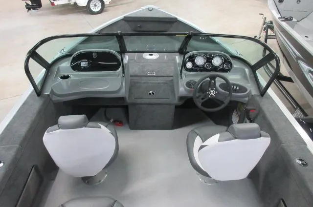 Slide: The Image of 2023 Smoker Craft Pro Angler 172 boat interior with dual seats and control console. - 2