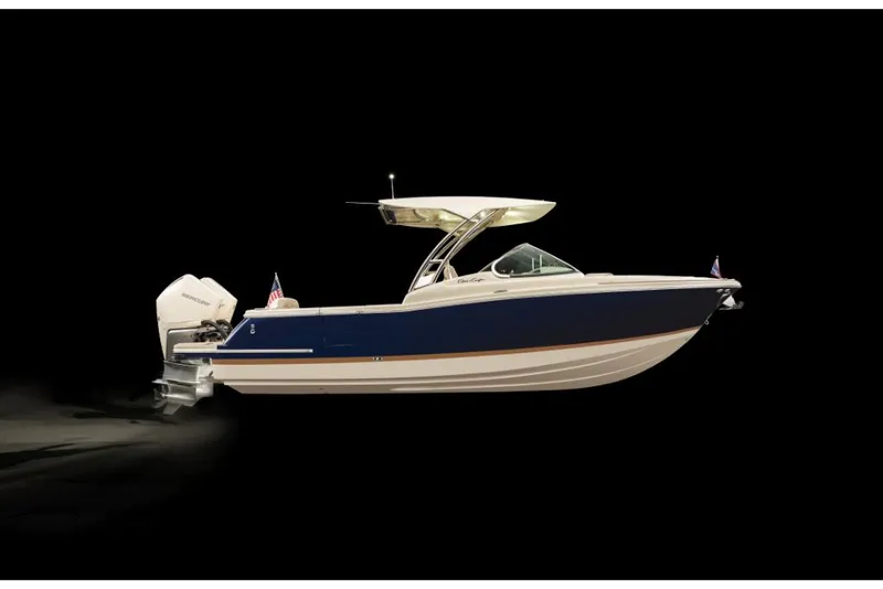 Slide: The Image of 2023 Chris-Craft Calypso 27 boat with dual outboard engines on black background. - 1