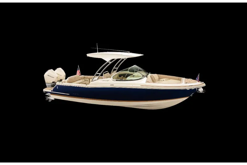 Slide: The Image of 2023 Chris-Craft Calypso 27 boat with dual outboard engines, navy blue hull. - 2