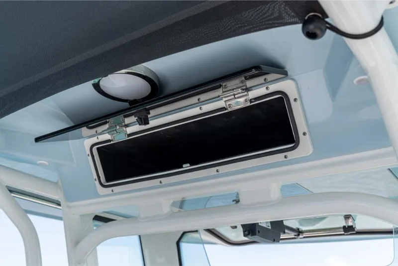 Slide: The Image of 2023 Boston Whaler 280 Dauntless overhead storage compartment. - 27