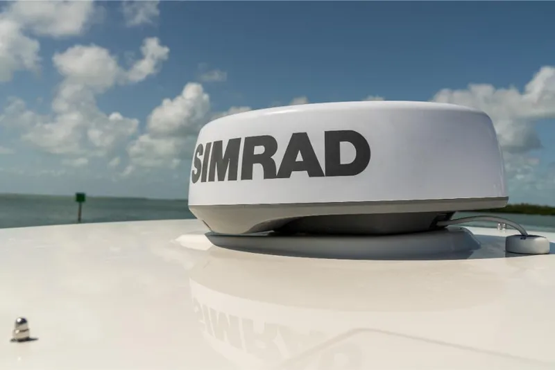 Slide: The Image of Simrad radar on 2023 Boston Whaler 280 Dauntless boat under clear sky. - 34