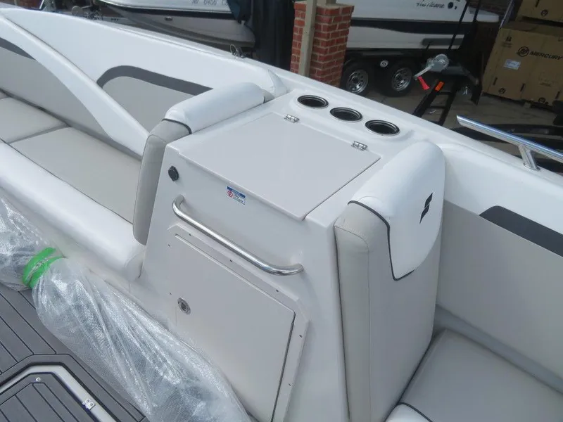 Slide: The Image of 2023 Starcraft SVX OB 231 OB boat interior with seating and storage compartment. - 11