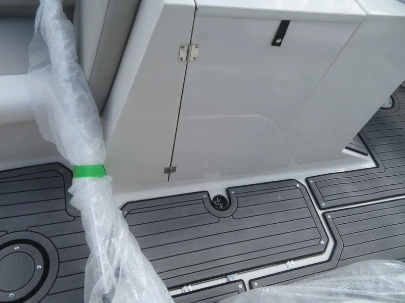 Slide: The Image of 2023 Starcraft SVX OB 231 OB boat deck and storage compartment. - 5