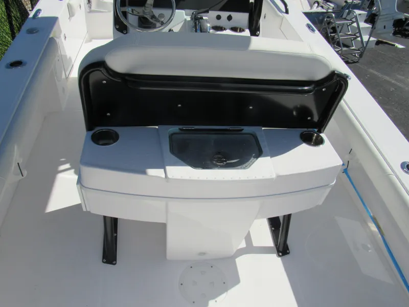 Slide: The Image of 2023 Everglades 253 CC boat interior with seating and console. - 22