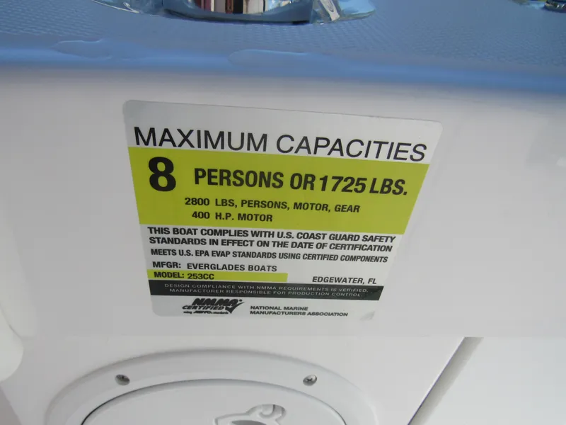 Slide: The Image of Maximum capacities label on 2023 Everglades 253 CC boat, 8 persons or 1725 lbs. - 30