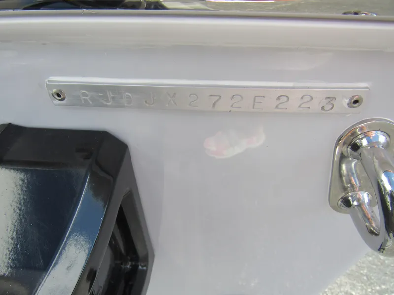Slide: The Image of 2023 Everglades 253 CC boat hull identification number (HIN) plate. - 32