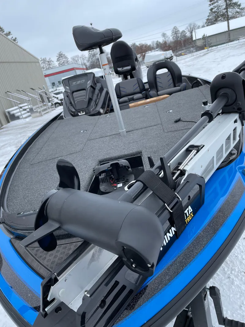 Slide: The Image of 2023 Nitro Z20 fishing boat with Minn Kota trolling motor on snowy day. - 3