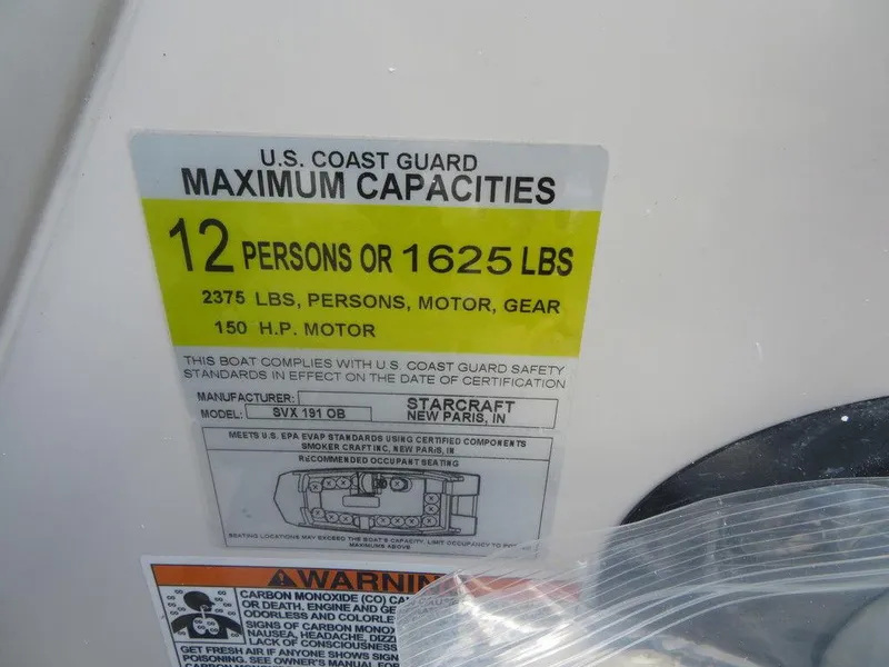 Slide: The Image of 2023 Starcraft SVX OB 191 OB capacity label, 12 persons or 1625 lbs, 150 HP motor. - 12