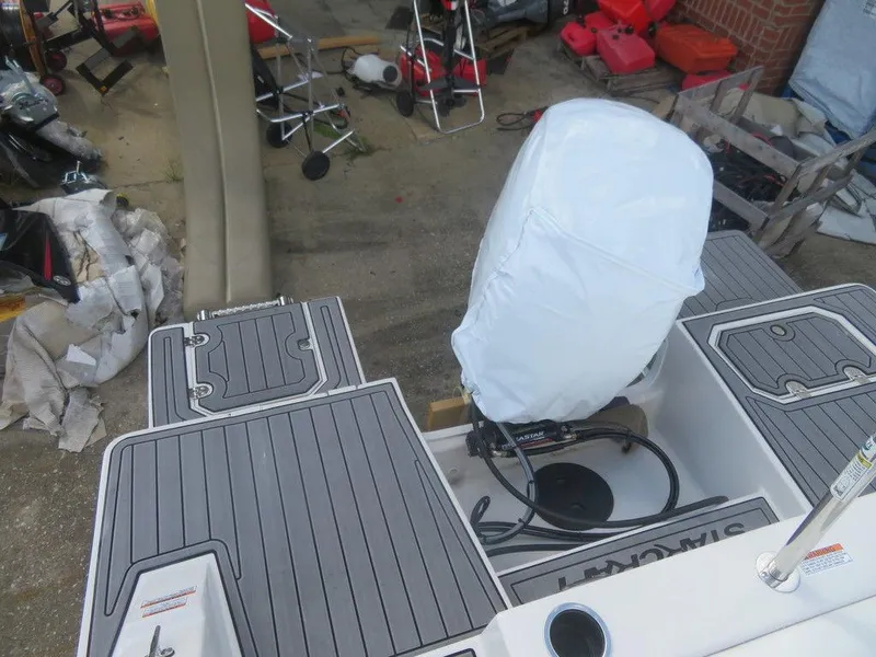 Slide: The Image of 2023 Starcraft SVX OB 191 OB boat with covered outboard motor. - 15
