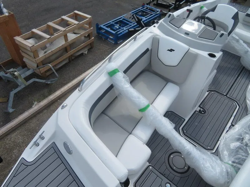 Slide: The Image of 2023 Starcraft SVX OB 191 OB boat interior with seating and deck view. - 3