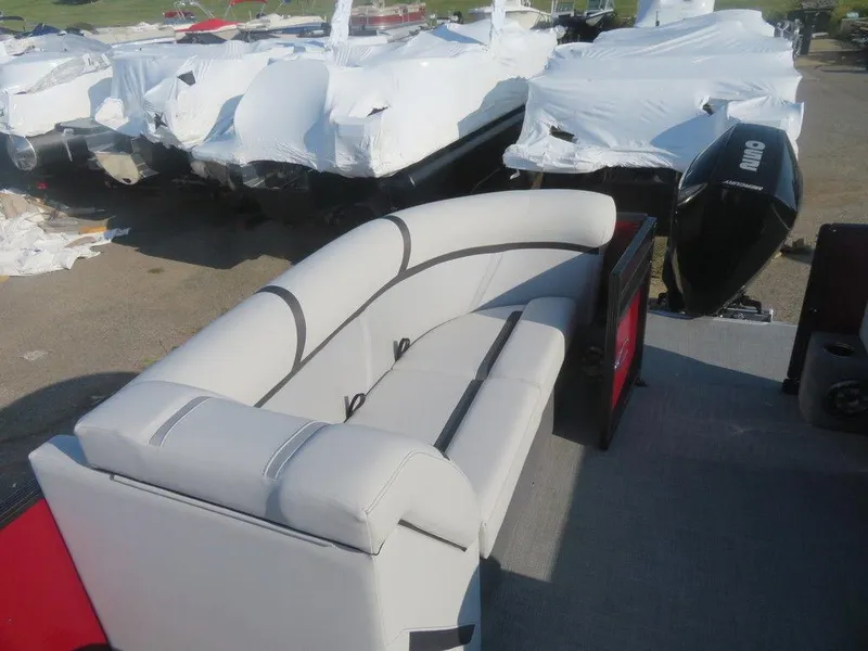 Slide: The Image of 2023 Crest Classic LX 240 SLC CPT pontoon boat with cushioned seating. - 10