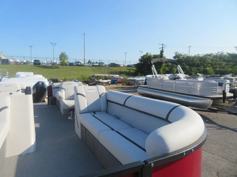 Slide: The Image of 2023 Crest Classic LX 240 SLC CPT pontoon boat with spacious seating. - 13