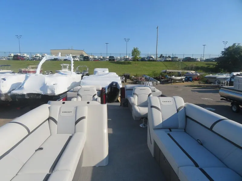 Slide: The Image of 2023 Crest Classic LX 240 SLC CPT pontoon boat with spacious seating. - 15