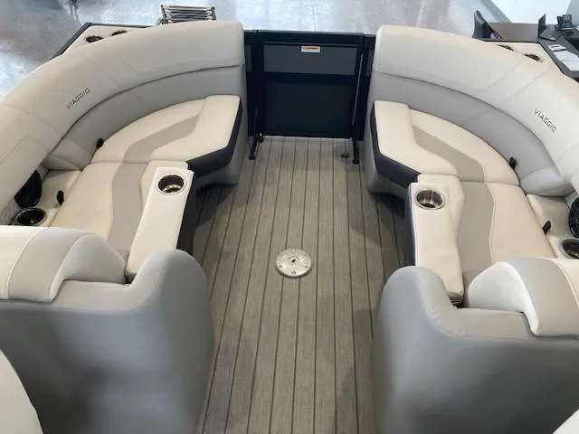 Slide: The Image of 2023 Viaggio Diamante 23U boat interior with plush seating and cup holders. - 16