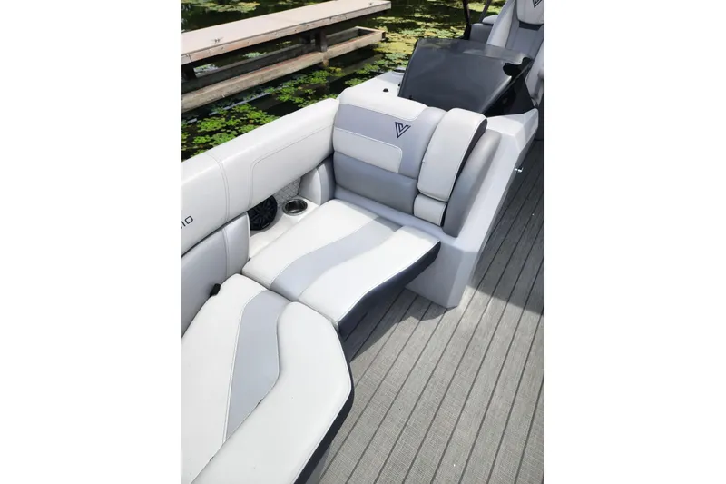 Slide: The Image of 2023 Viaggio Diamante 23U boat interior with sleek, modern seating and cup holder. - 20