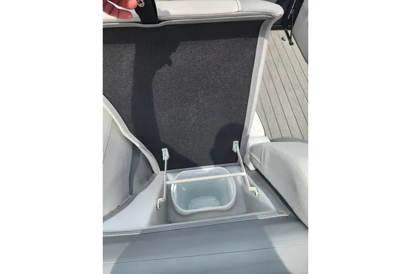 Slide: The Image of 2023 Viaggio Diamante 23U boat seat storage compartment with open lid. - 24