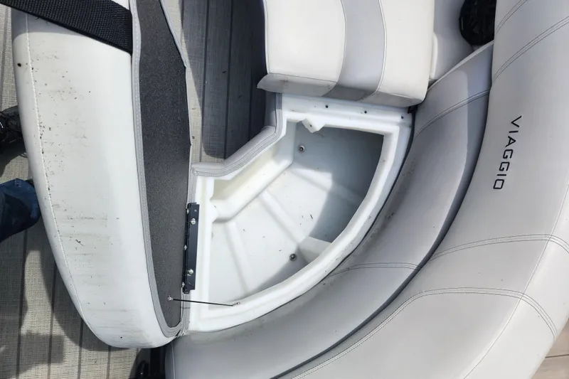 Slide: The Image of 2023 Viaggio Diamante 23U boat seat storage compartment, open and empty. - 25