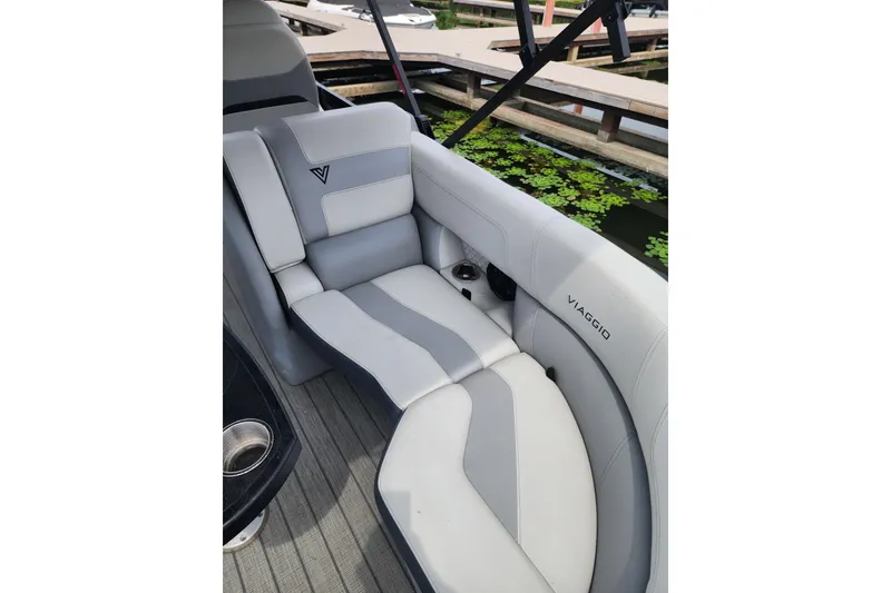 Slide: The Image of Luxurious seating on 2023 Viaggio Diamante 23U boat, featuring sleek gray and white upholstery. - 36