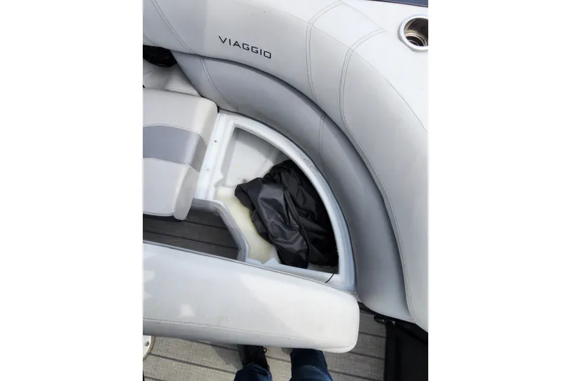 Slide: The Image of 2023 Viaggio Diamante 23U boat interior storage compartment with gray upholstery. - 39