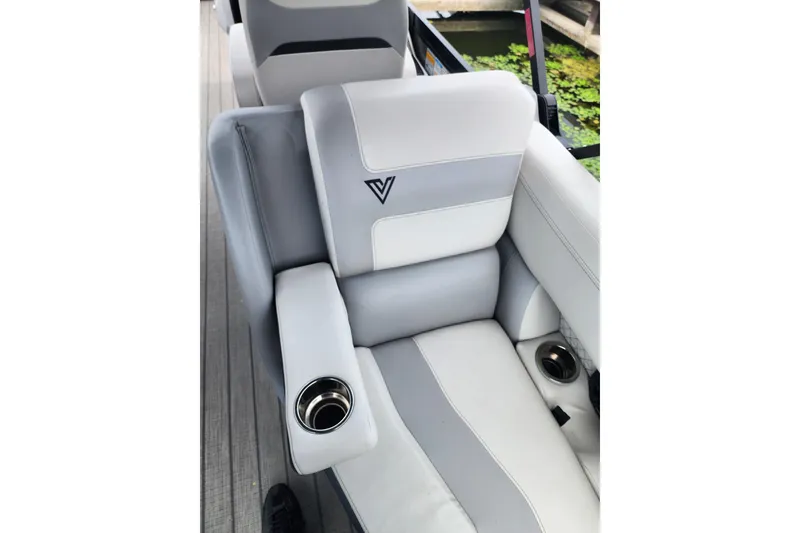 Slide: The Image of Luxurious seating on 2023 Viaggio Diamante 23U boat with cup holders and sleek design. - 41