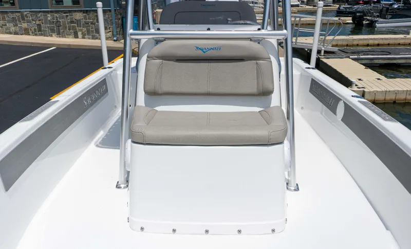 Slide: The Image of 2023 Savannah 190 IS boat interior with cushioned seating and sleek design. - 14