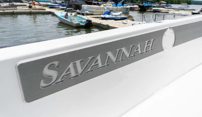 Slide: The Image of 2023 Savannah 190 IS boat docked at marina - 9