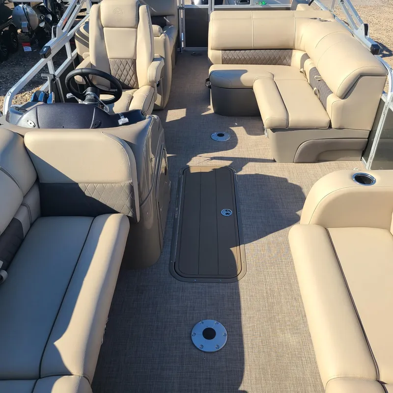 Slide: The Image of Interior of 2023 Sun Tracker Party Barge 22 RF XP3 pontoon boat with beige seating. - 6