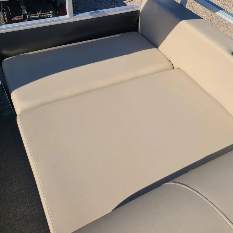 Slide: The Image of 2023 Sun Tracker Party Barge 22 RF XP3 beige cushioned seating area. - 7