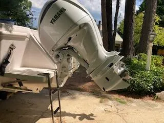 Slide: The Image of 2002 Intrepid 322 boat with Yamaha outboard motor. - 13