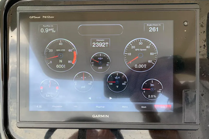 Slide: The Image of Garmin GPS display on a 2016 Scout 255 LXF boat showing various navigation metrics. - 10