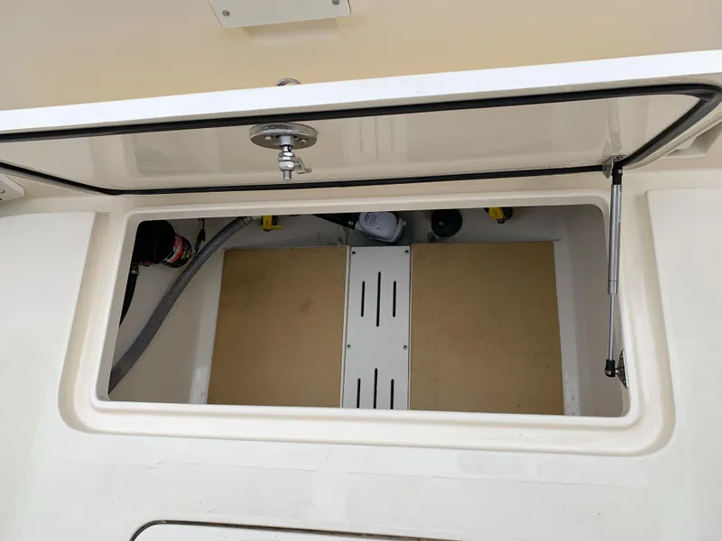 Slide: The Image of Storage compartment of a 2016 Scout 255 LXF boat. - 27