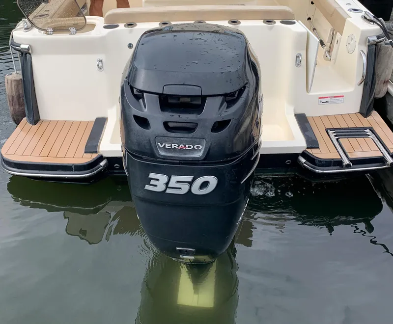 Slide: The Image of 2016 Scout 255 LXF with Verado 350 outboard motor in water. - 3