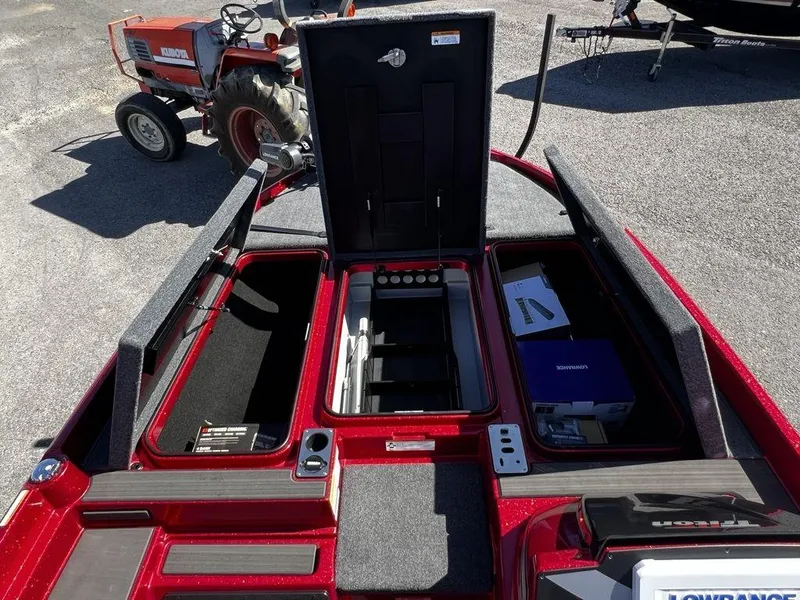Slide: The Image of 2022 Triton 21 XrT boat storage compartments and equipment. - 10