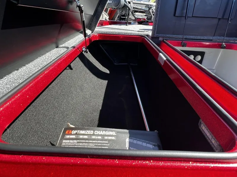 Slide: The Image of 2022 Triton 21 XrT boat storage compartment with optimized charging system. - 11