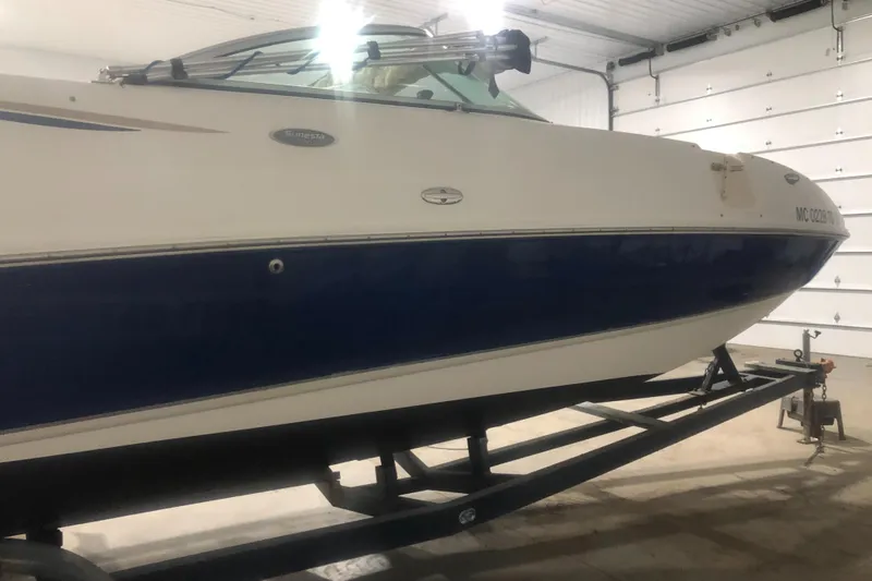 Slide: The Image of 2004 Chaparral 274 SUNESTA boat on trailer in indoor storage. - 12