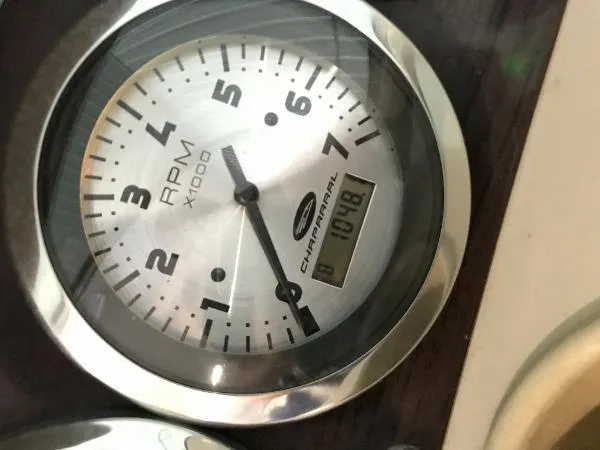 Slide: The Image of Close-up of 2004 Chaparral 274 SUNESTA RPM gauge showing 107.8 hours. - 7