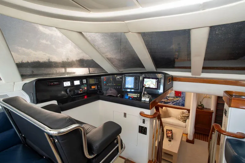 Slide: The Image of Cockpit of 1993 Able Custom 97' yacht with navigation equipment and seating. - 9
